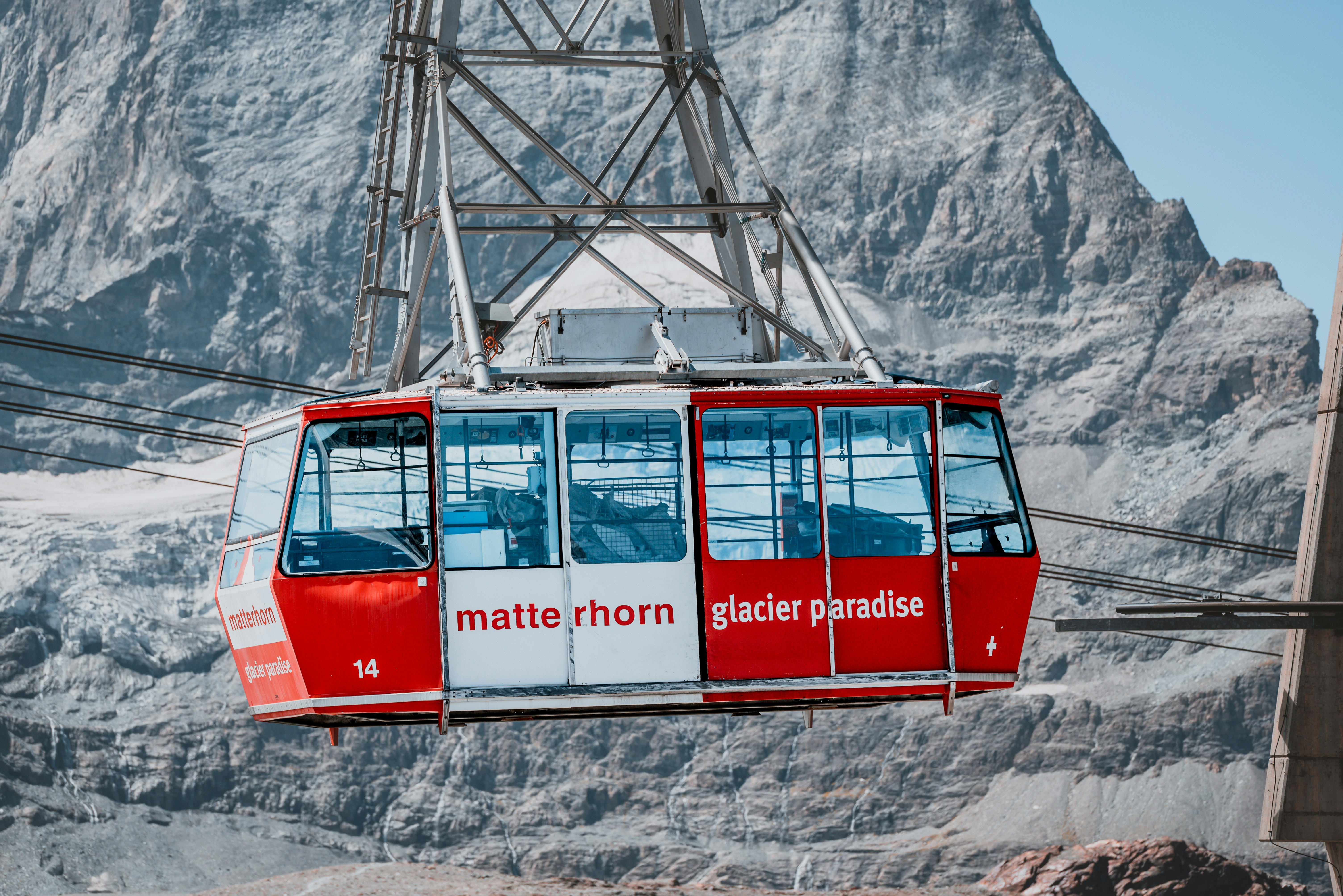 a cable car going up a mountain