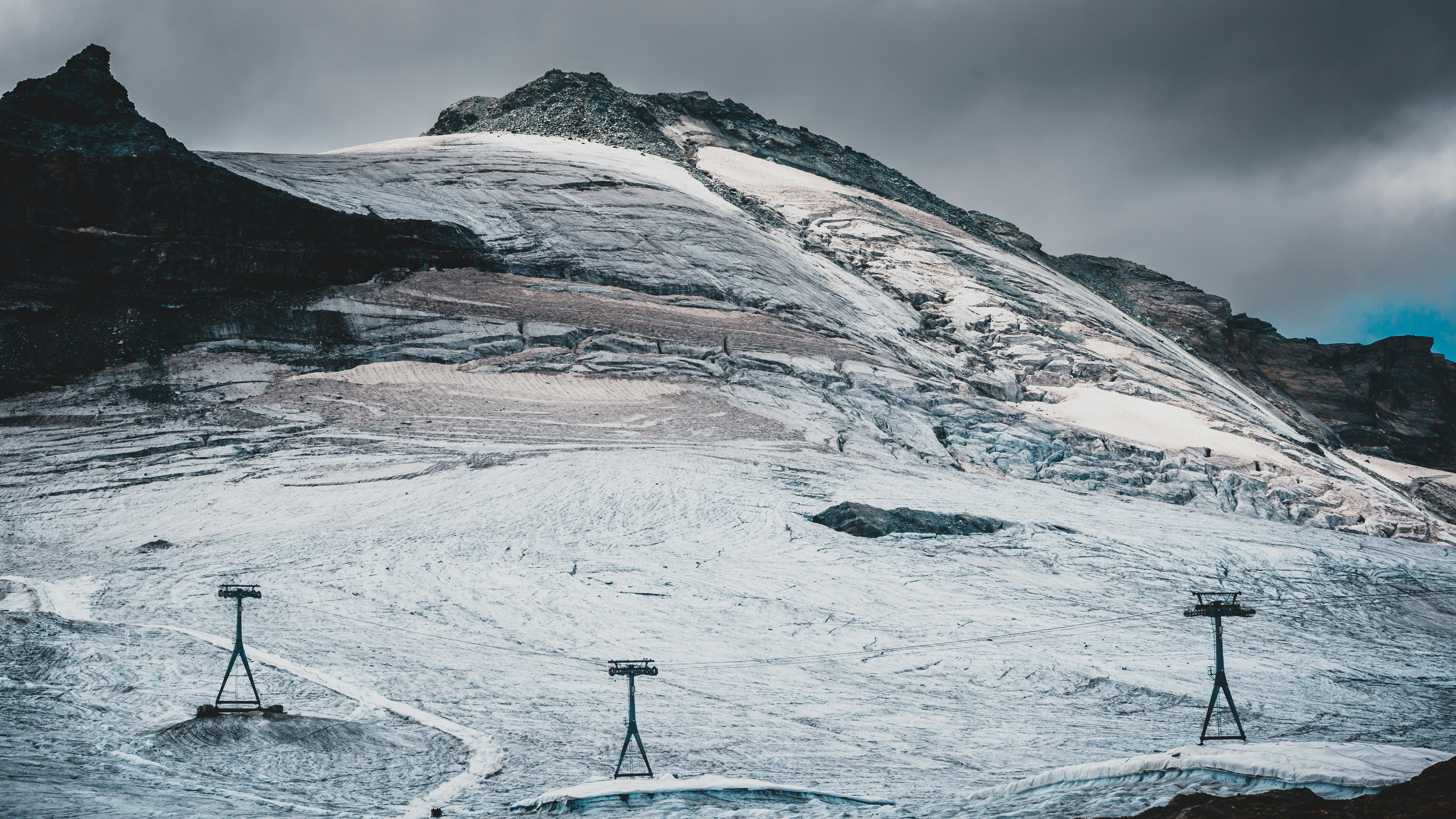 Closed sky slopes at the Matterhorn Glacier Paradise due to warm summer.
