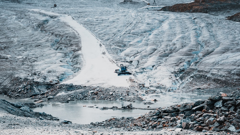 a boat on a snowy river