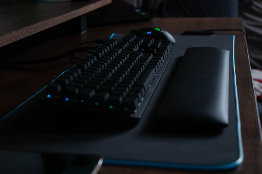 a black keyboard on a desk
