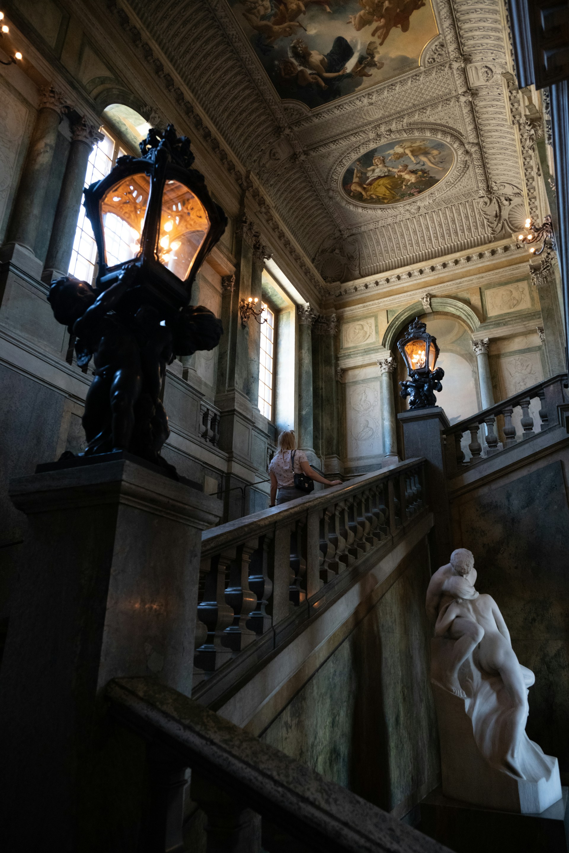 a person sitting on a staircase