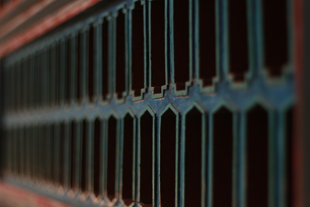 a close-up of a metal fence