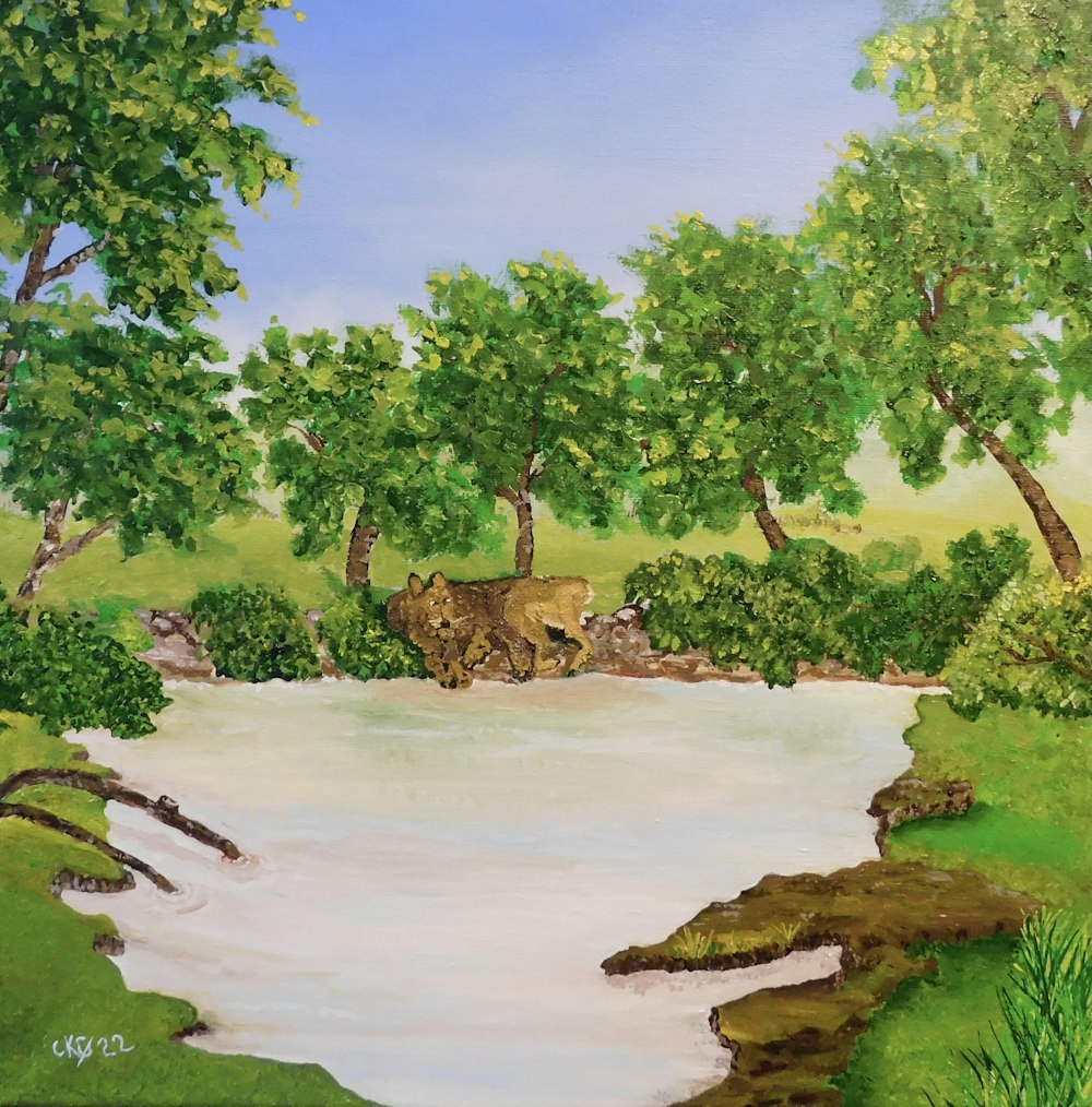 나무와 바위가있는 강