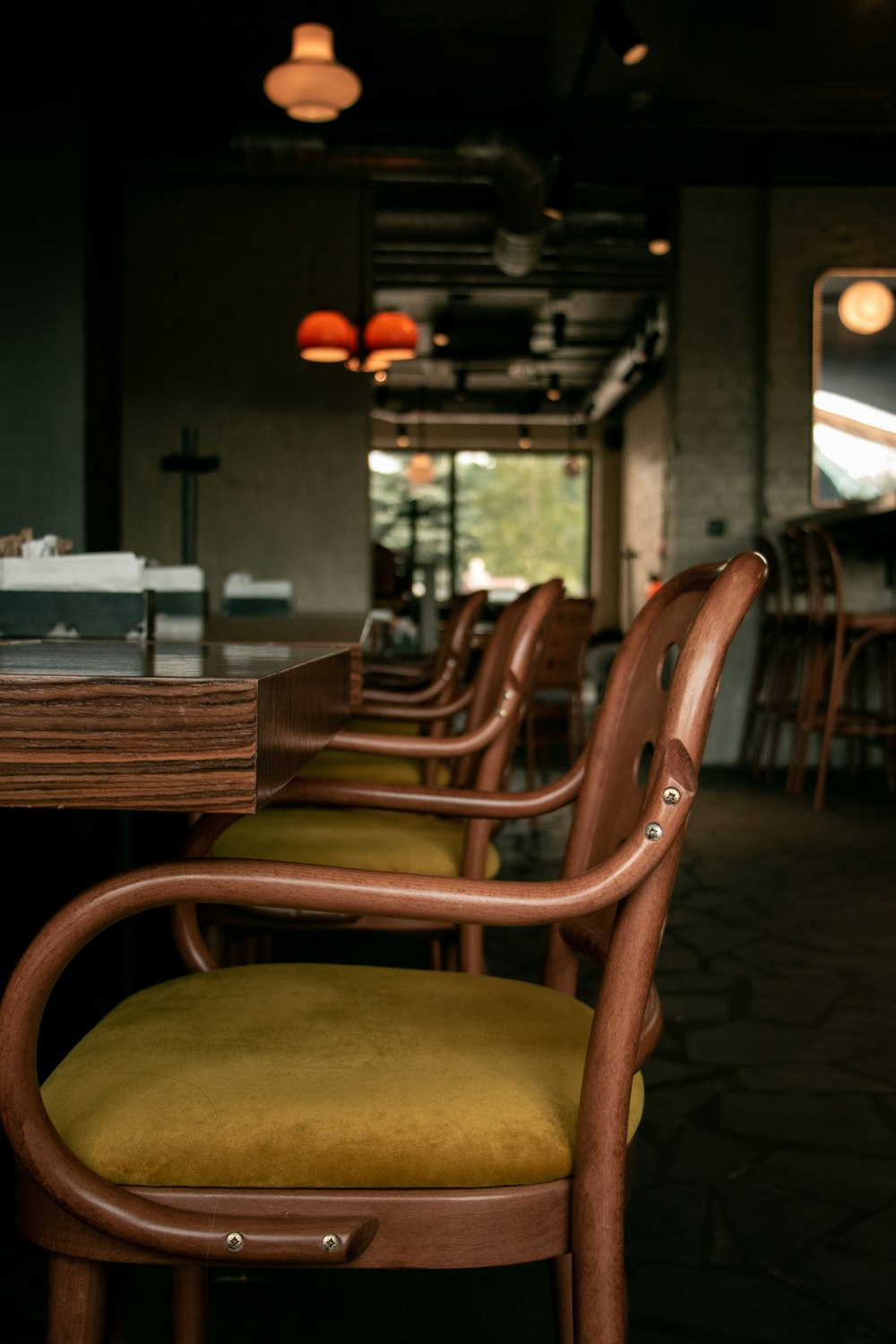 a row of wooden chairs