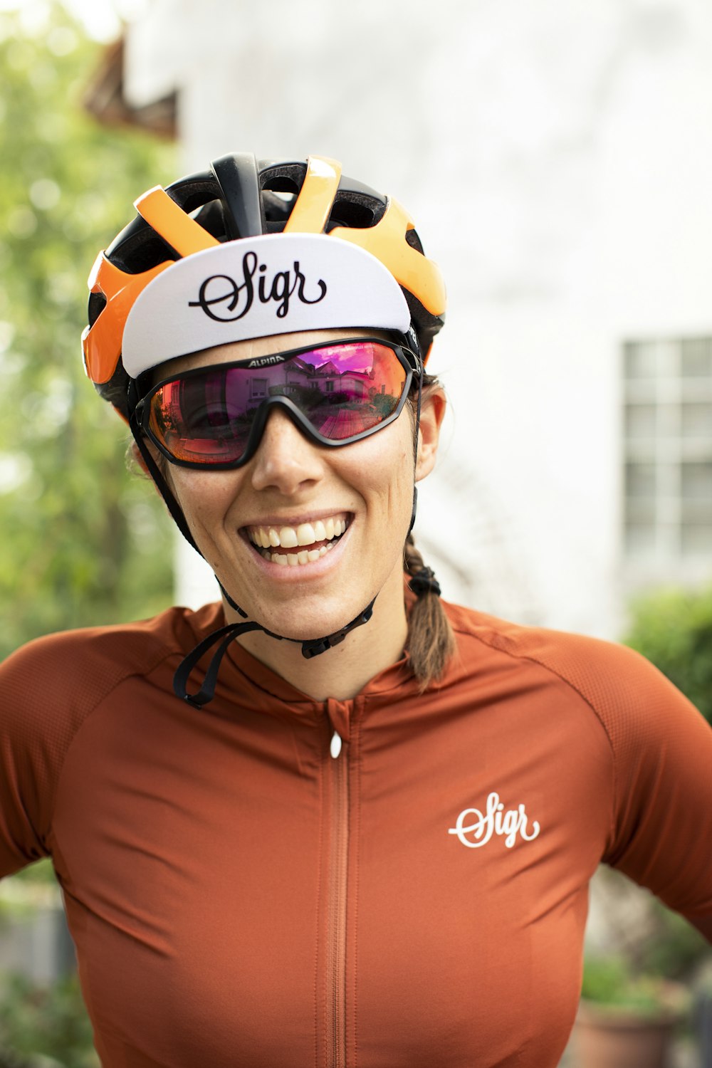 a person wearing a helmet and sunglasses