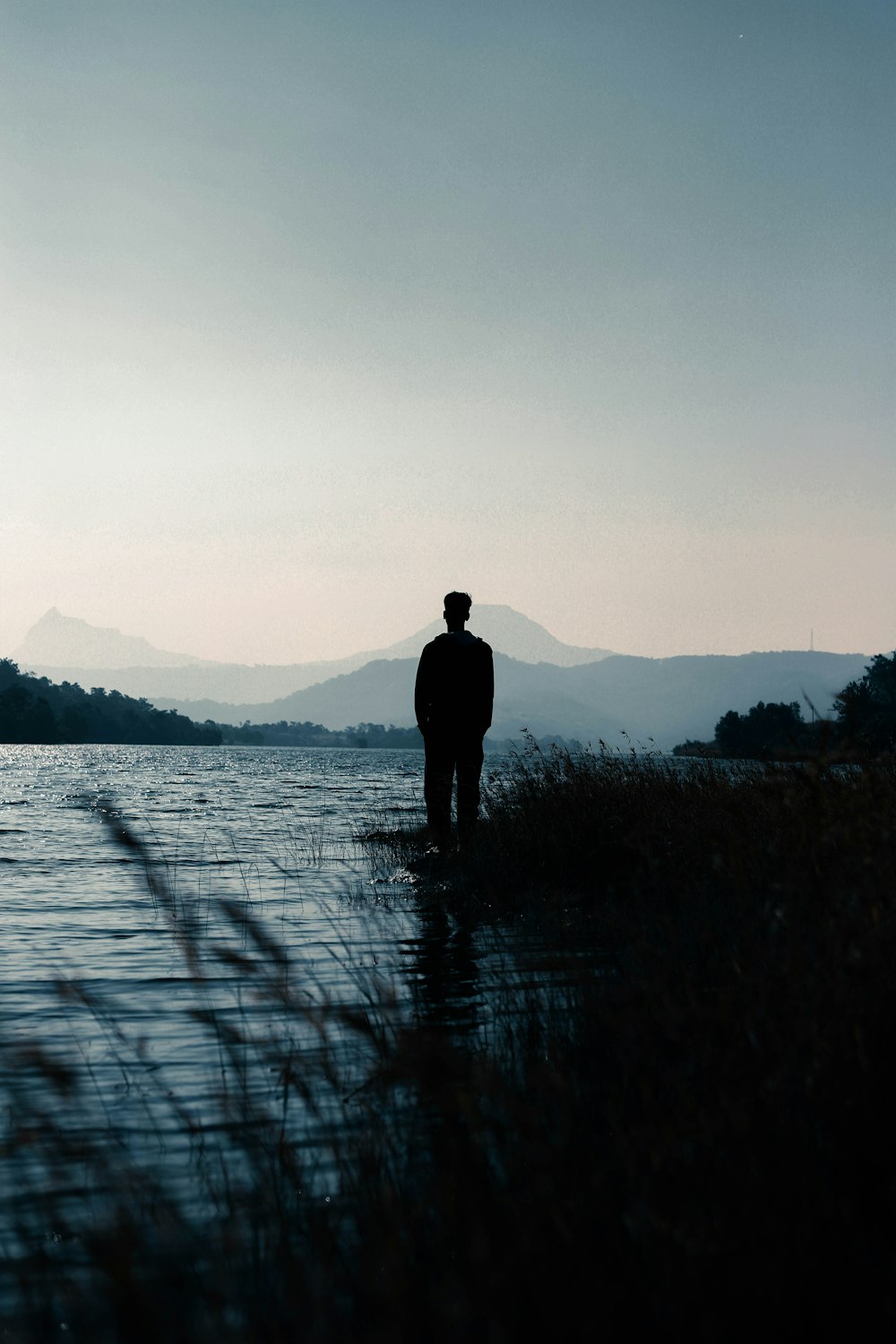 a man standing in a lake