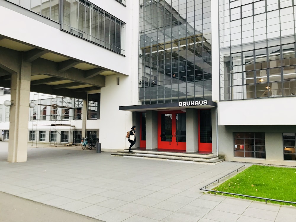 a person walking outside of a building