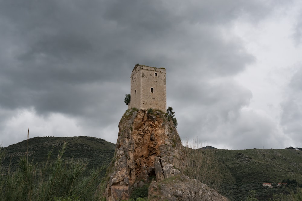 a stone castle on a cliff