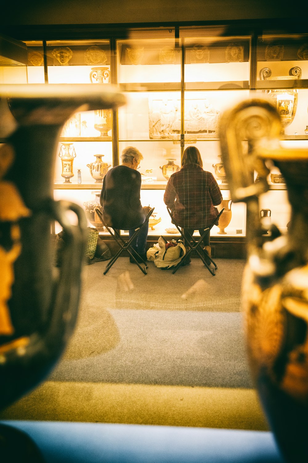 a group of people sitting in a restaurant