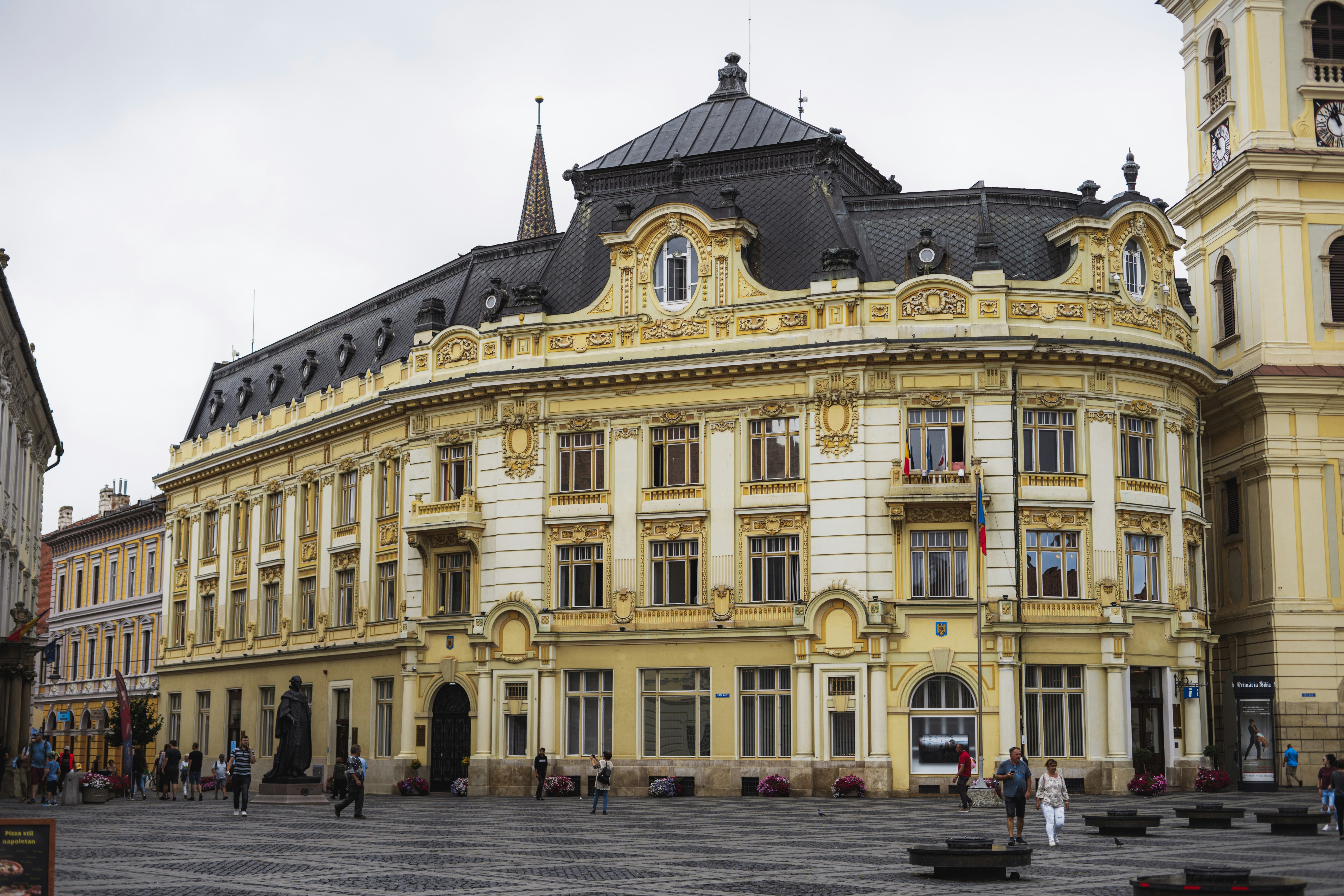 a building with people walking around