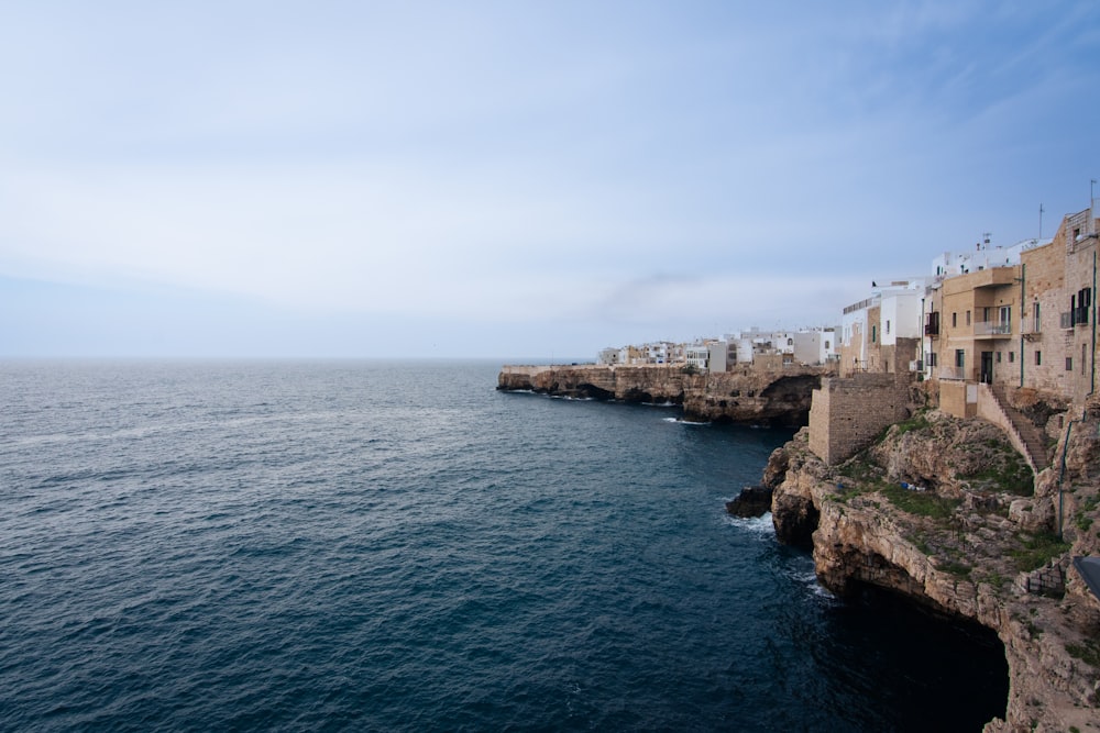 a body of water with buildings along it