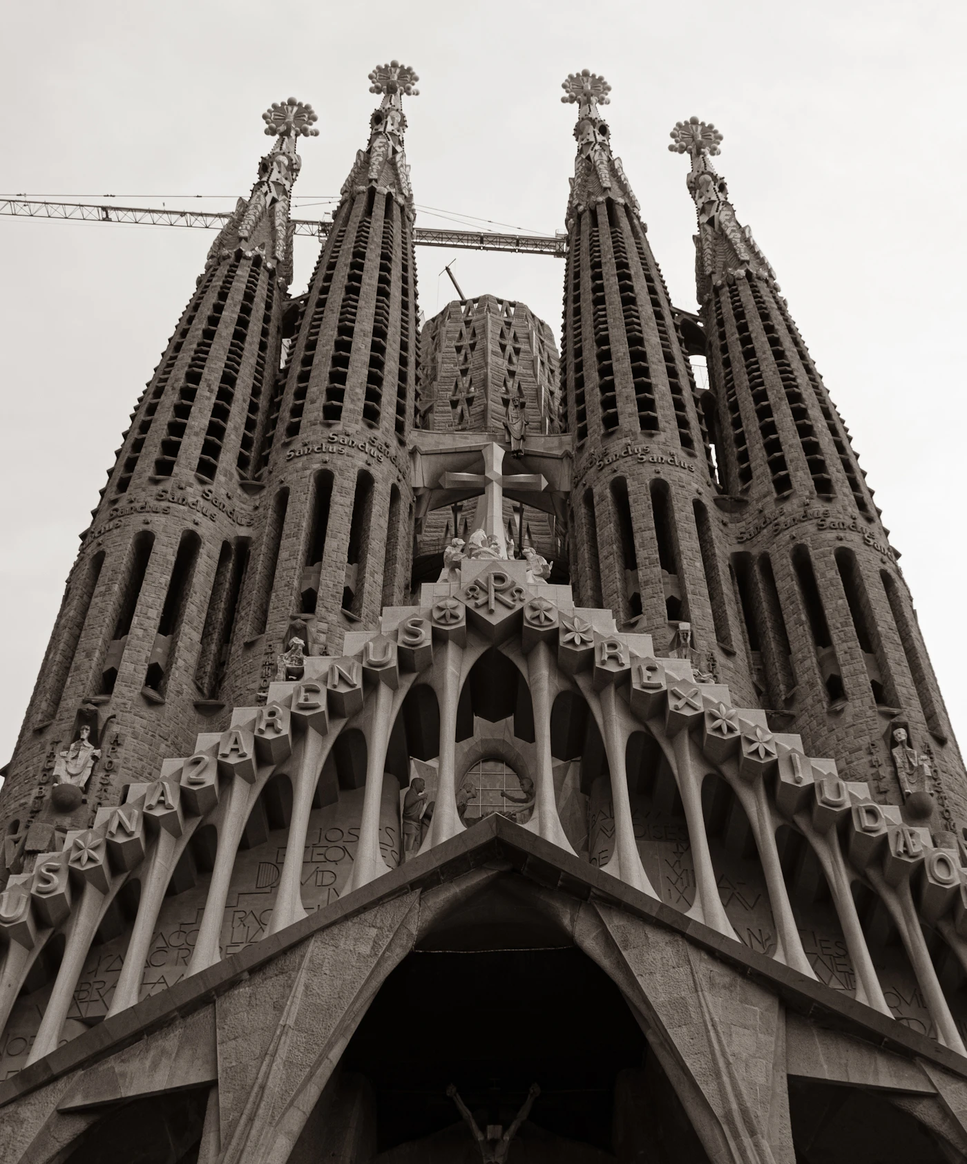 Towers of the Sagrada Familia rising above the Barcelona rooftops