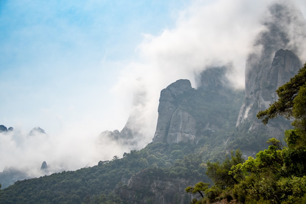 a mountain with clouds