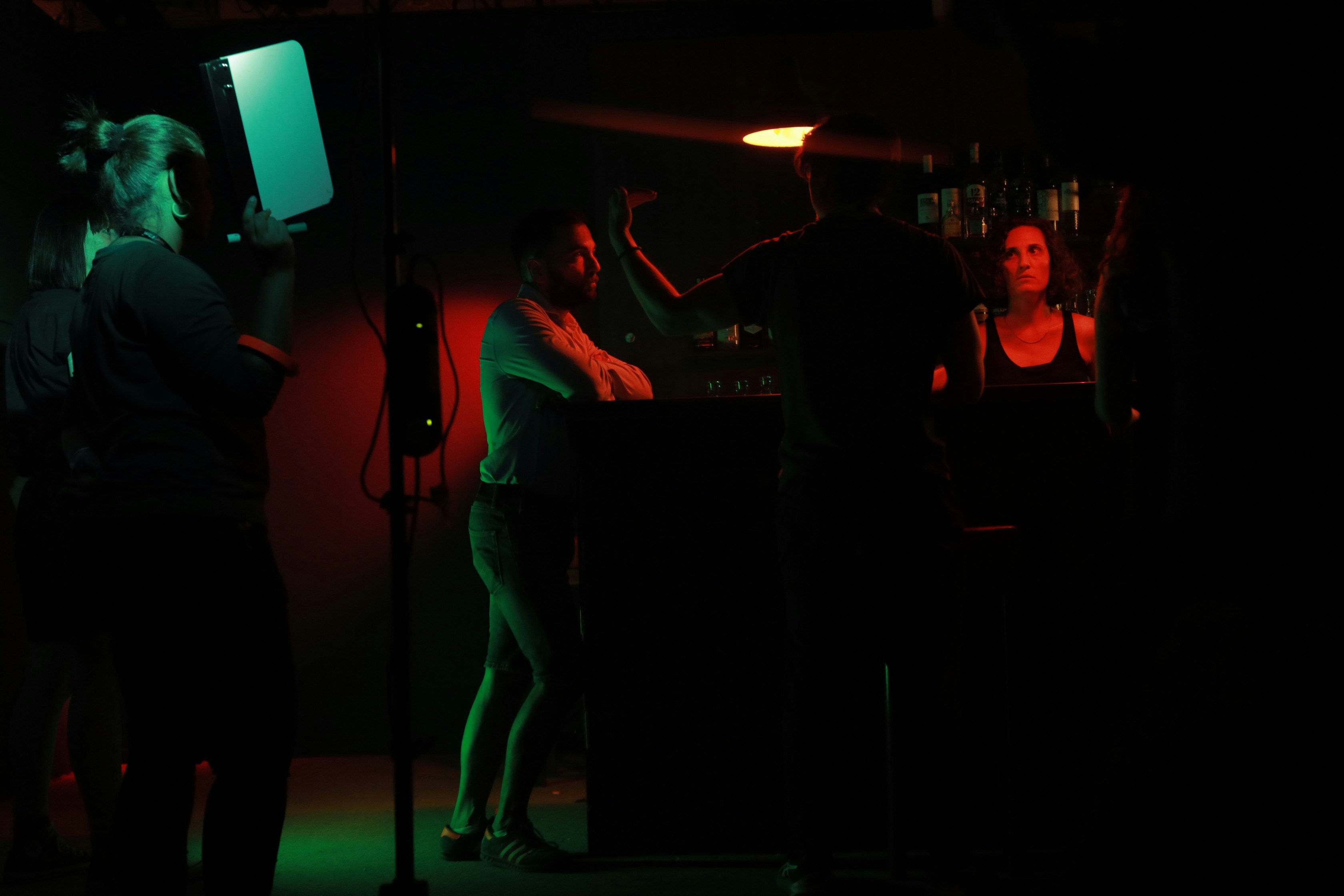 a group of people in a dark room