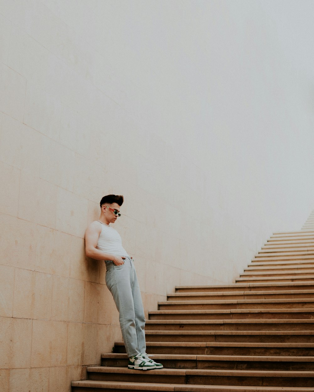 a man standing on a set of stairs