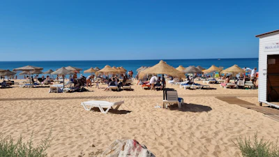 Beach with umbrellas and loungers