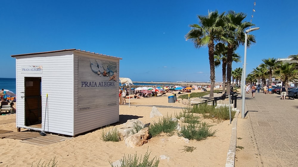 a sign on a beach