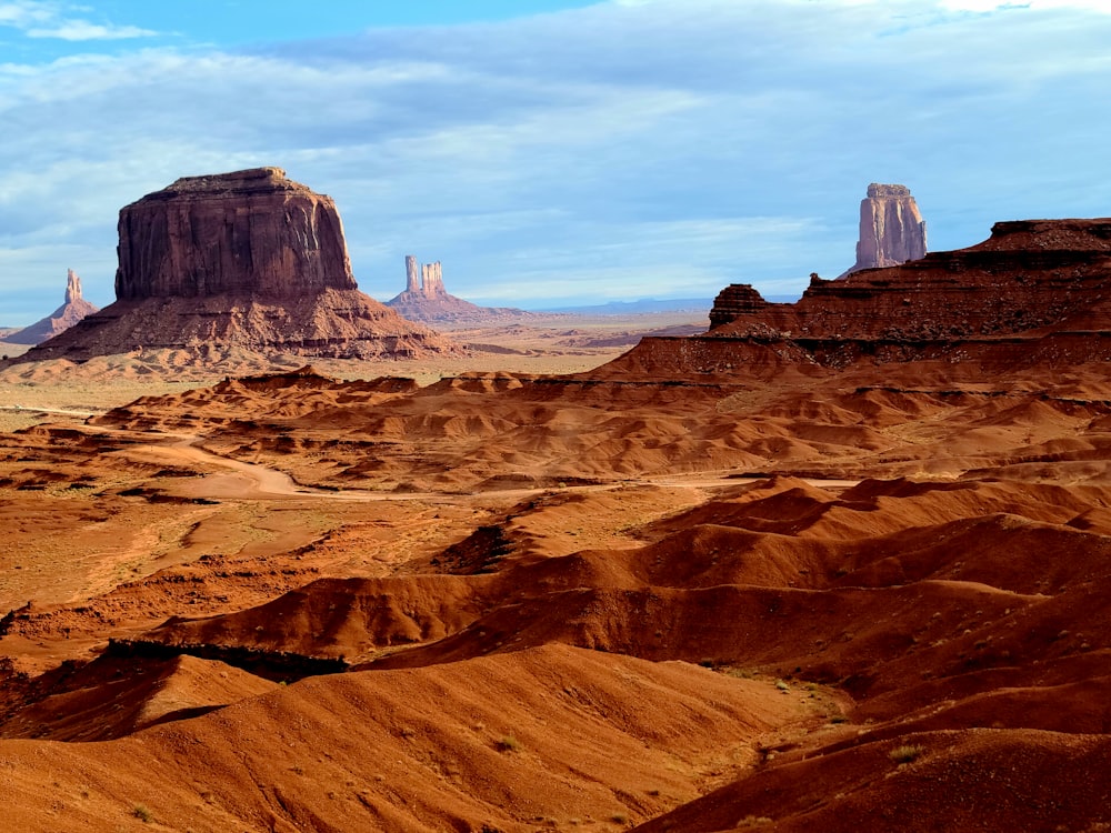 a desert landscape with tall rocks