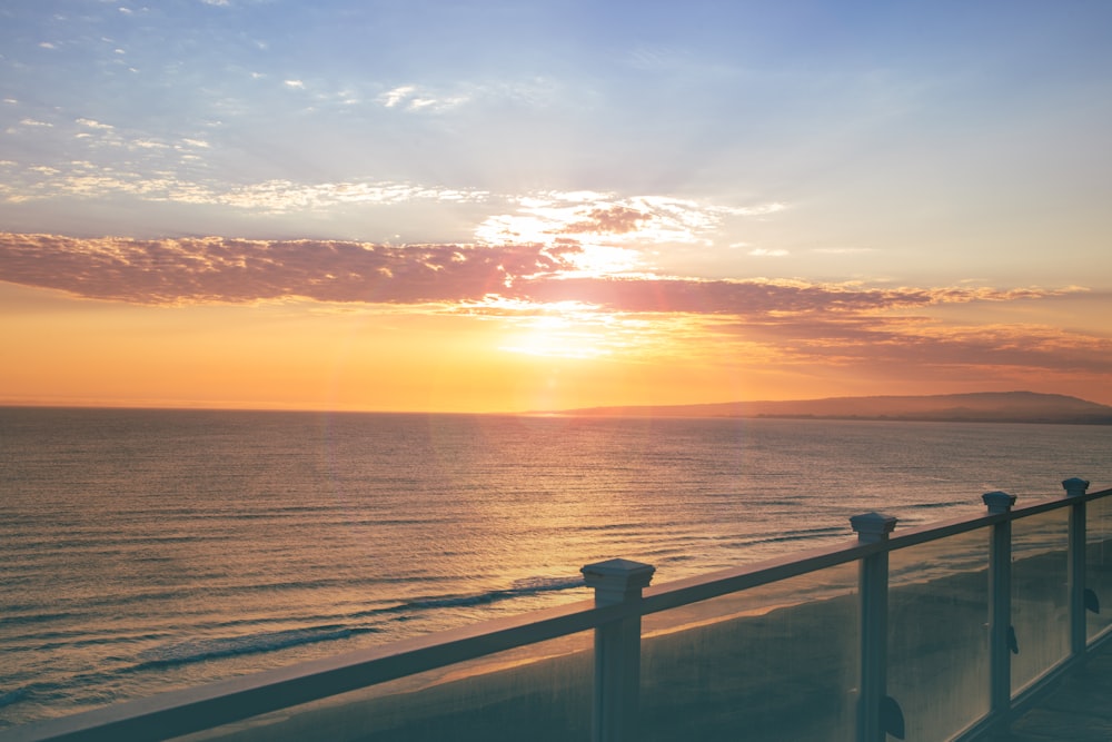 a sunset over a body of water