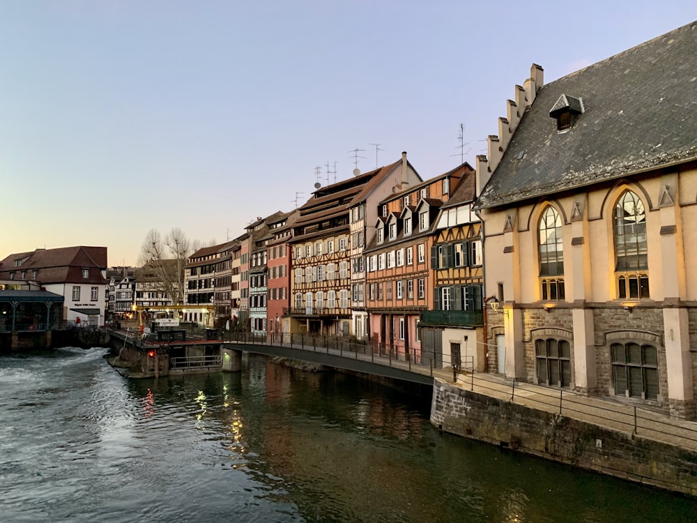 a body of water with buildings along it