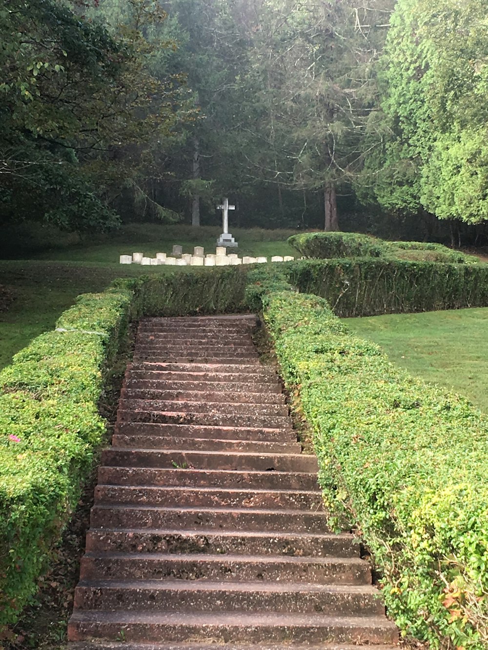 a set of stairs leading up to a statue