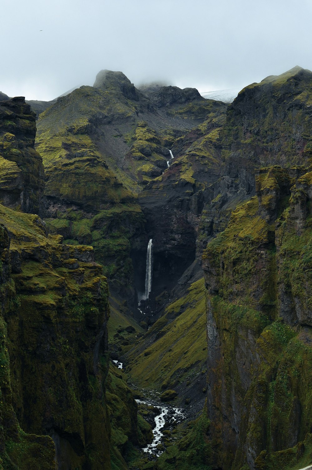 a waterfall in a rocky area