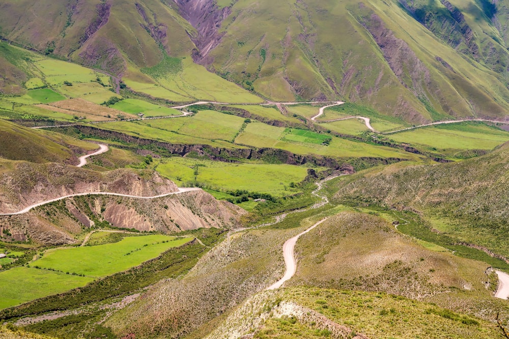 a winding road through a valley