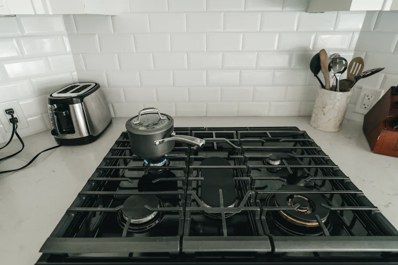 A stove top with pots and pans