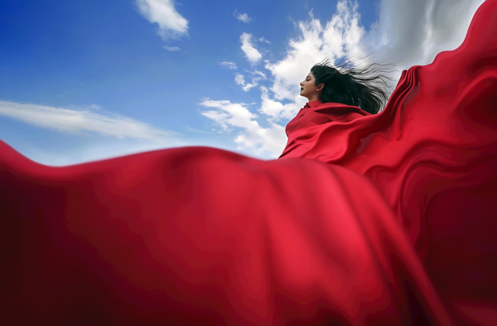 a man in a red dress