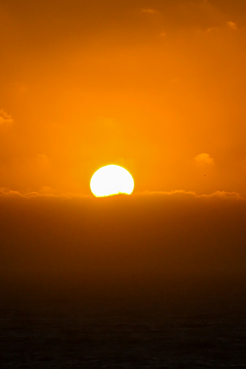 a sunset over the ocean