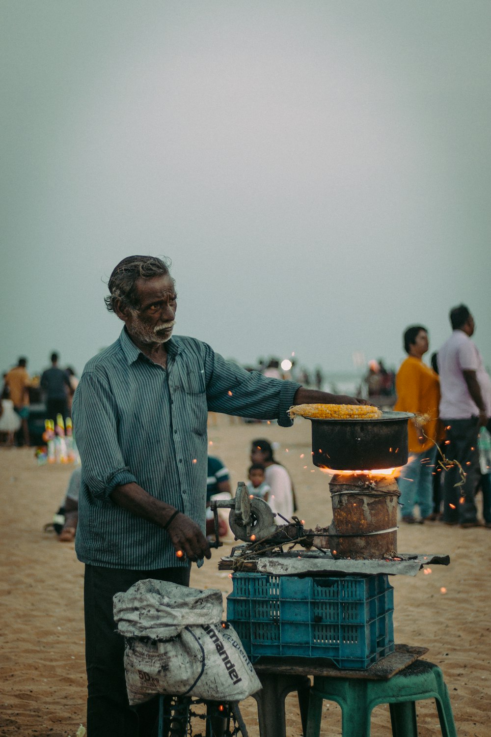 a man pushing a cart with food