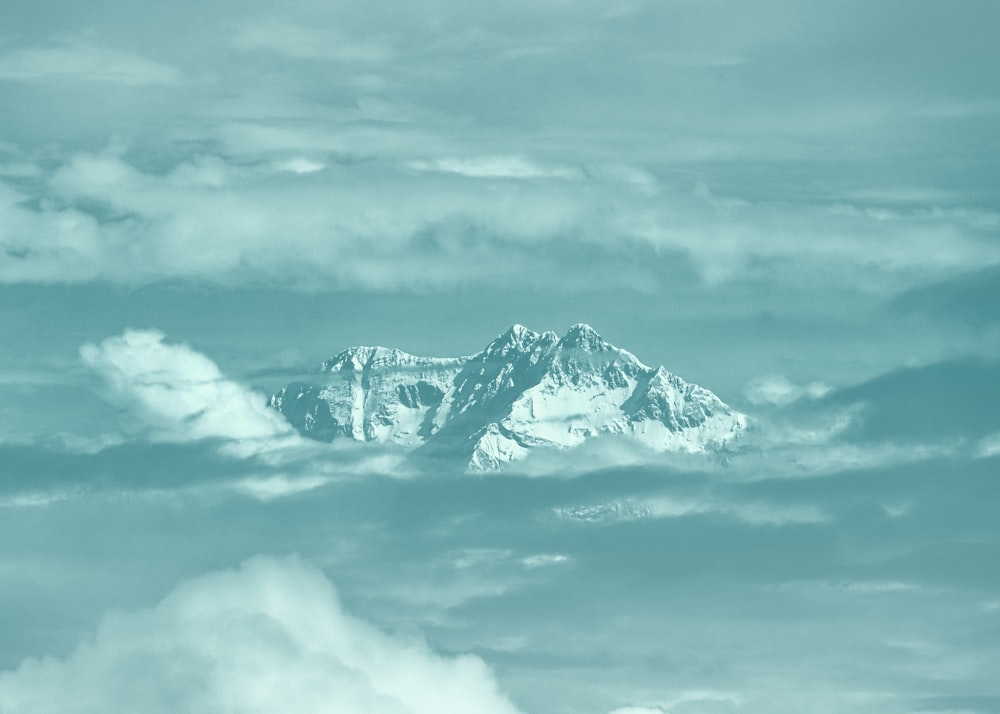 a mountain in the clouds