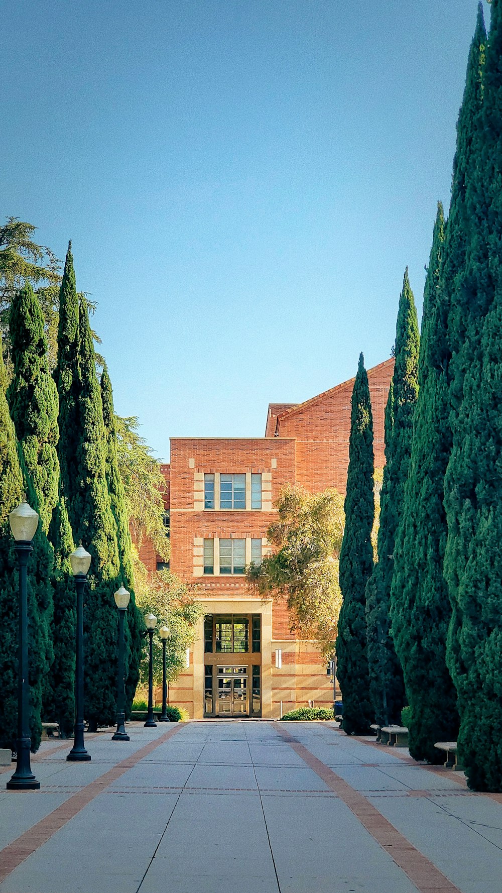 a brick building with a walkway