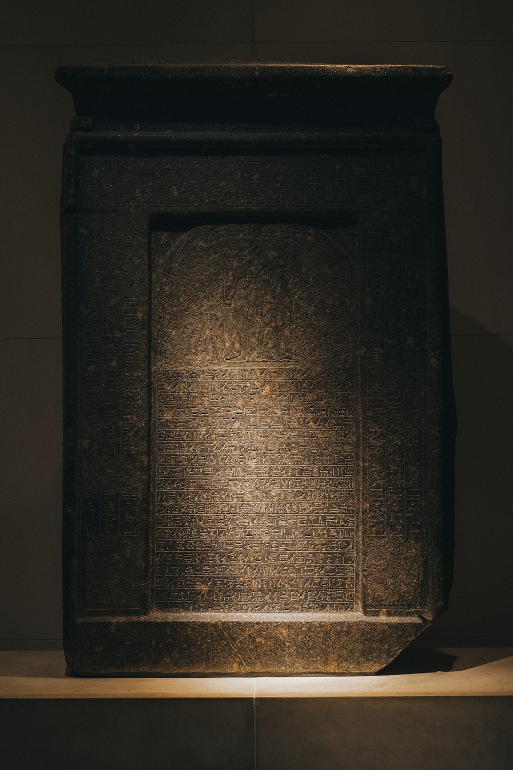 a stone plaque with a design
