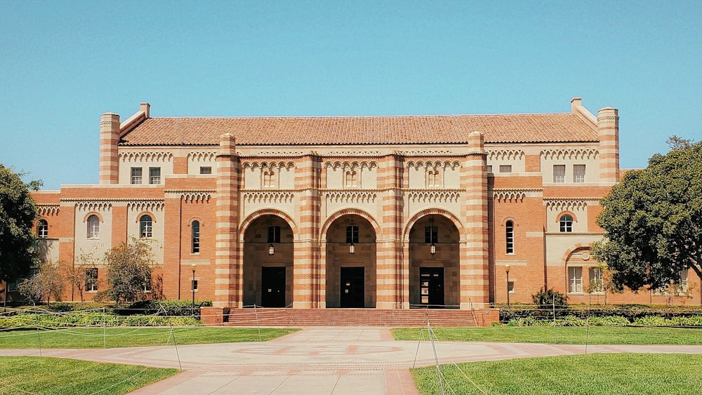 a large brick building with a courtyard
