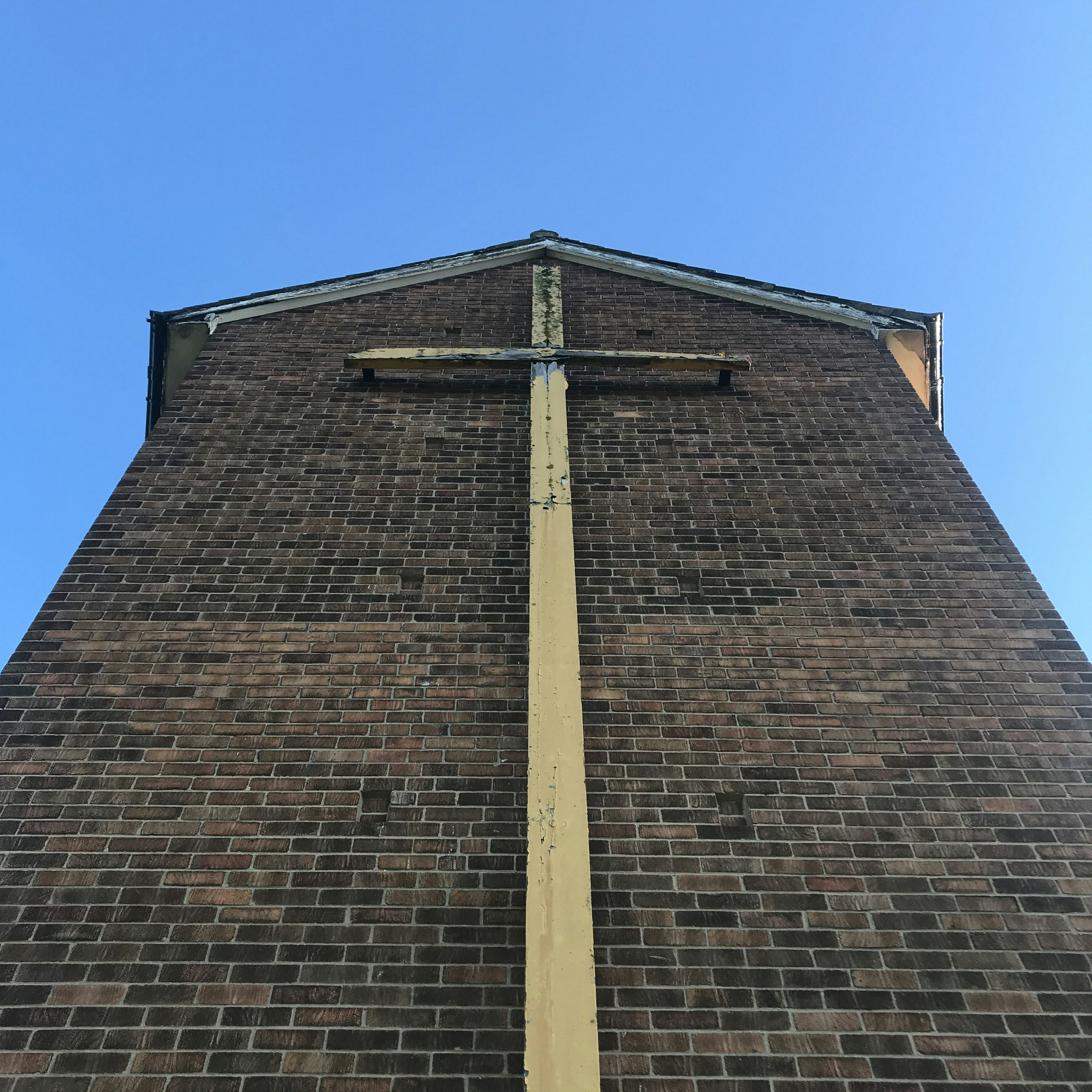 a brick building with a tall tower