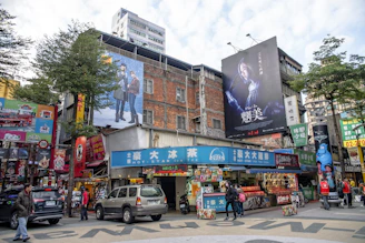Creative billboard advertisement in a busy urban street.