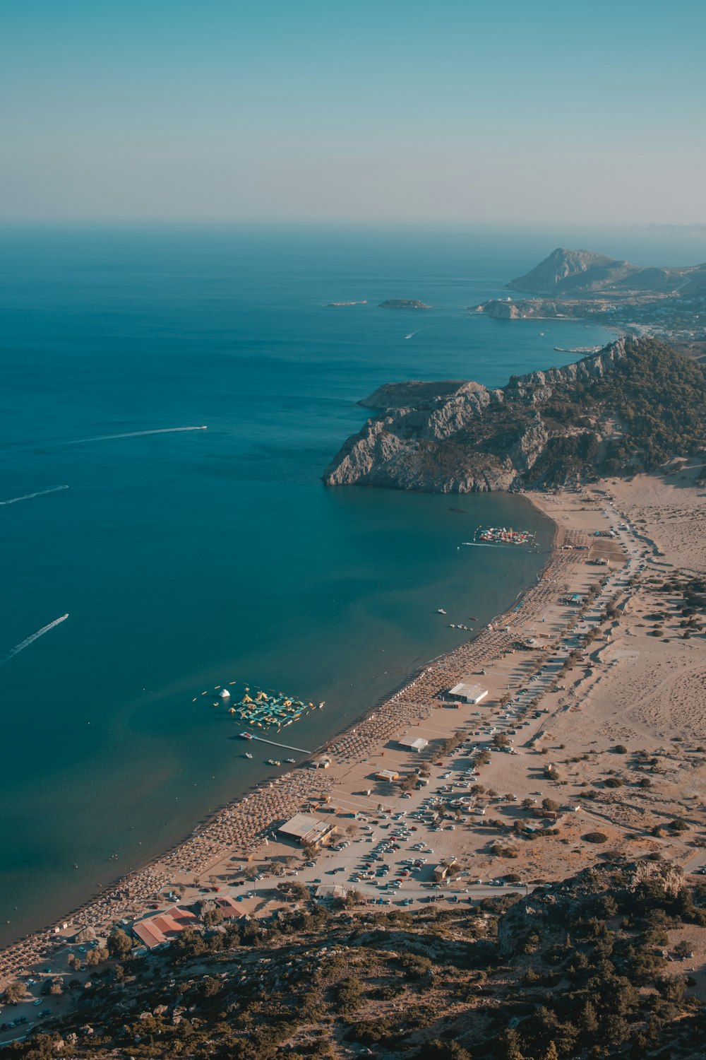 a beach with a body of water by it