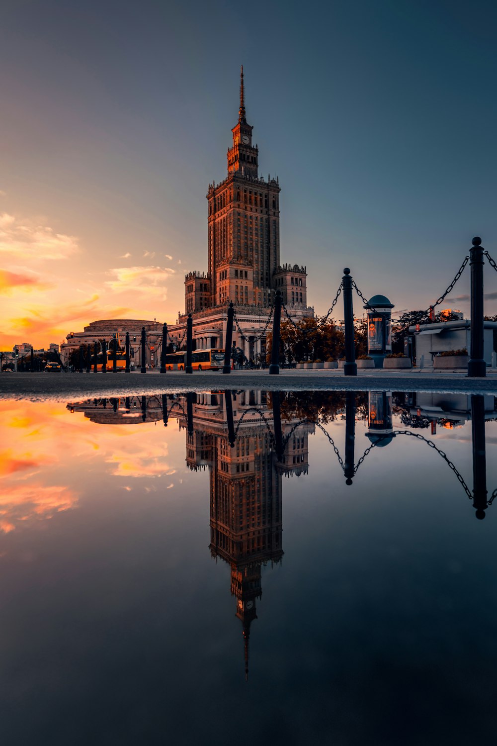 a reflection of a tower in water