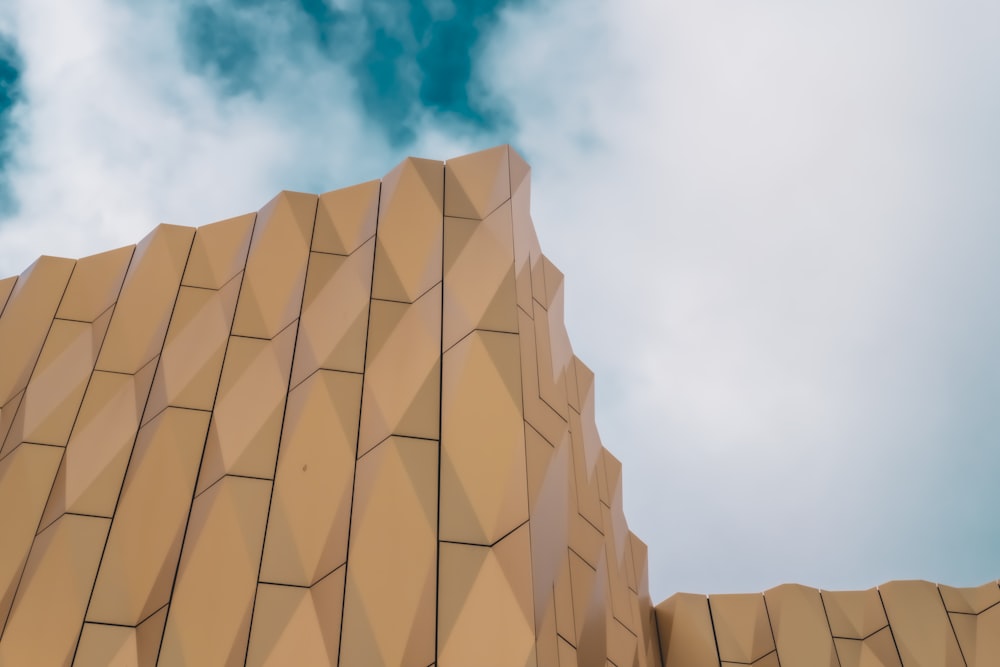 a building with a cloudy sky