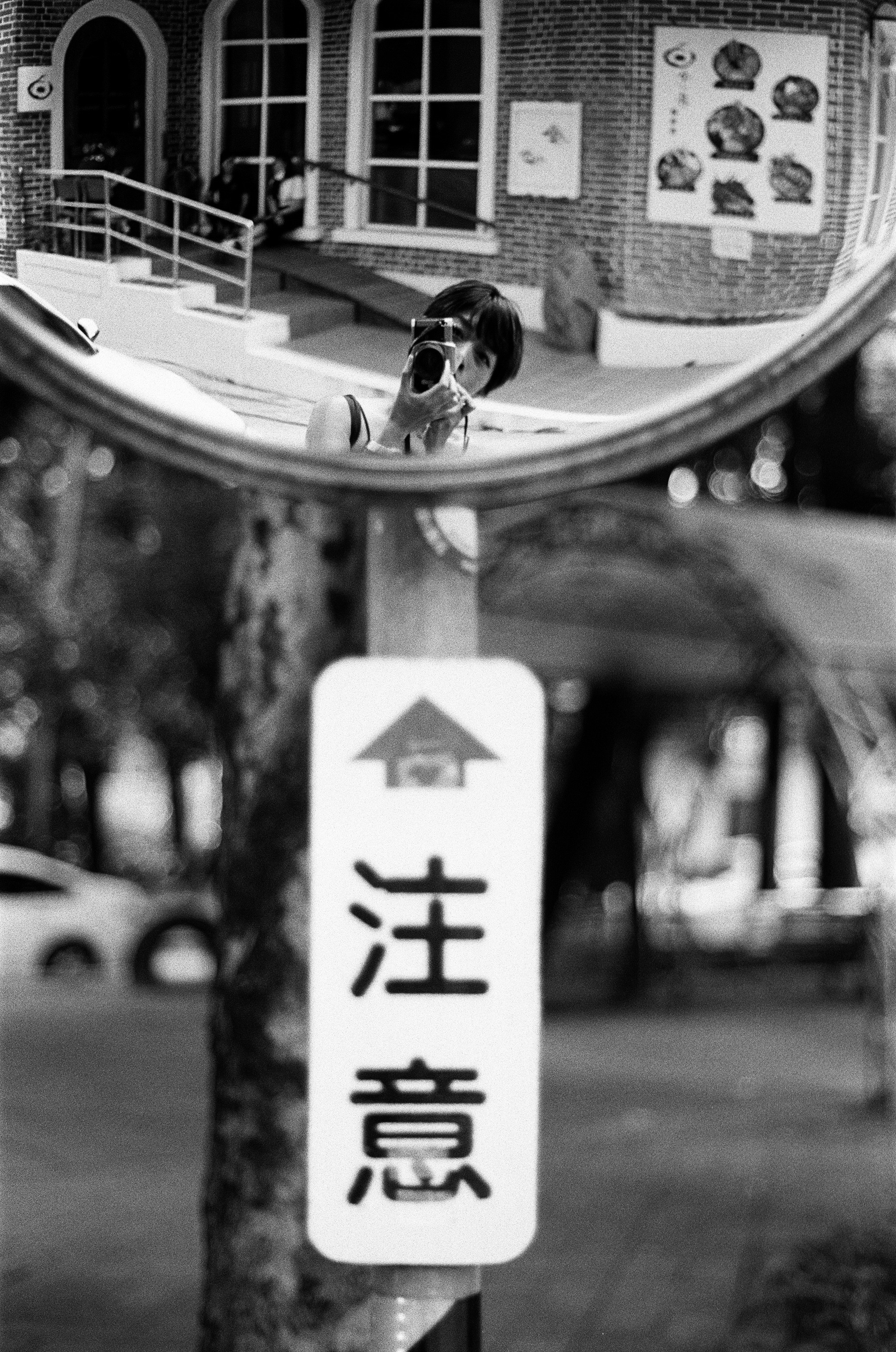 a sign on the sidewalk