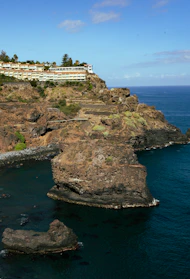 a building on a rocky island