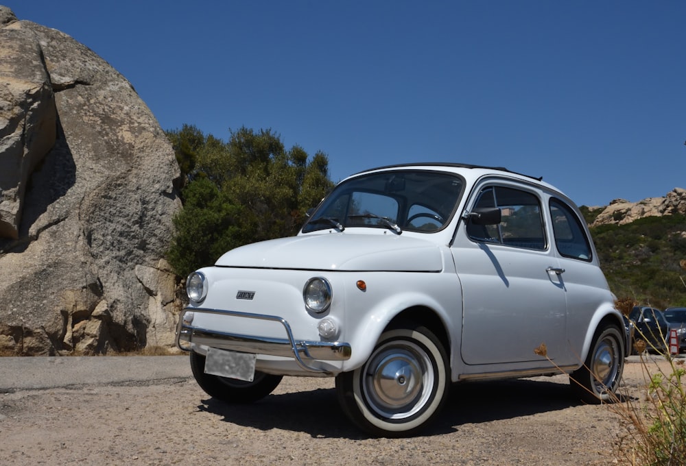 a car parked in a rocky area