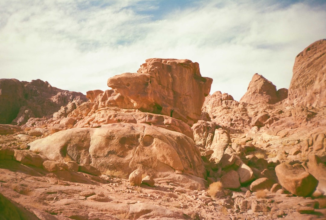 a rocky landscape with a few large rocks,