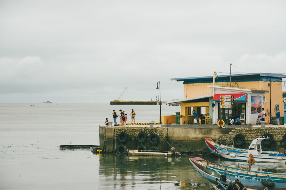 a group of people on a dock