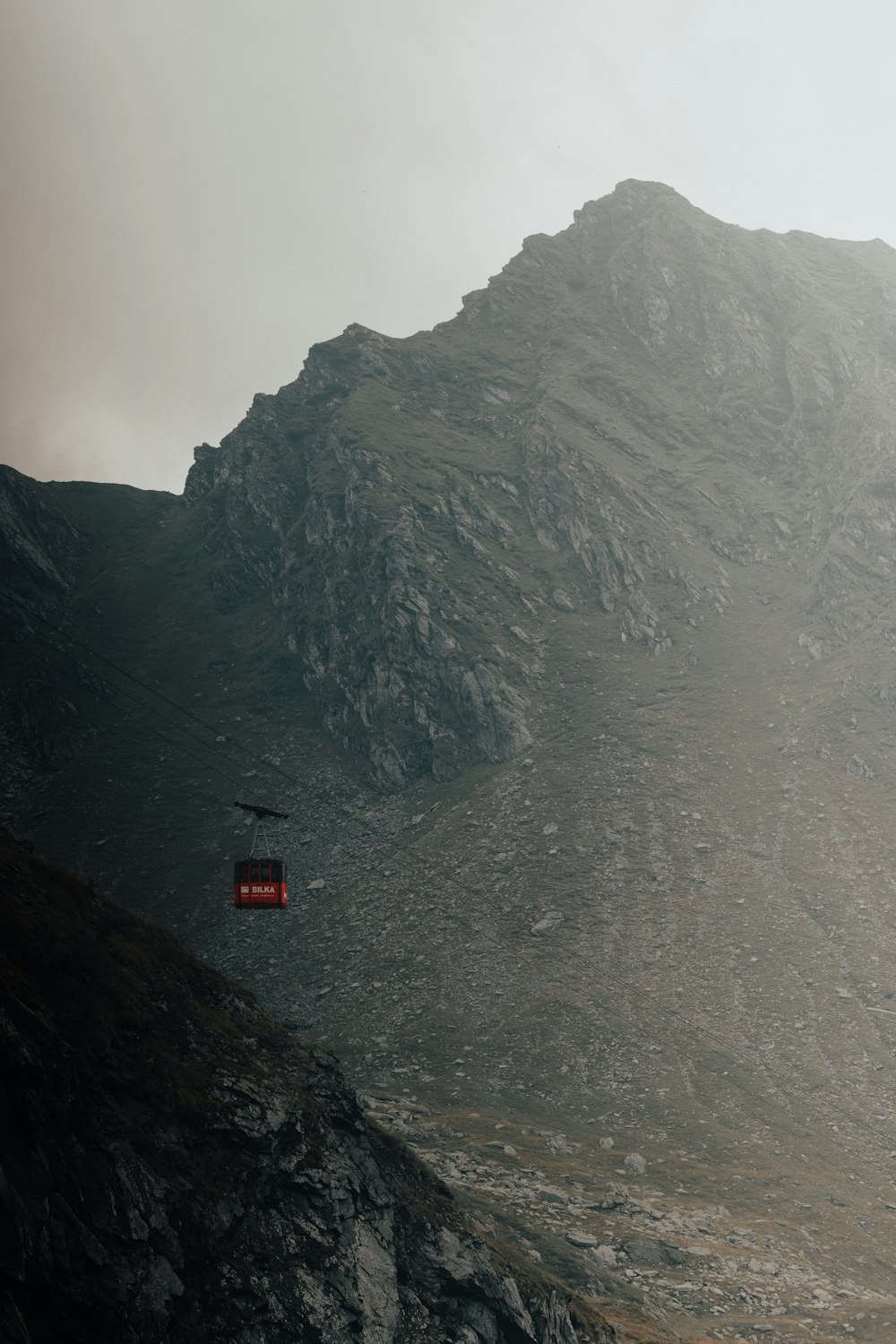 a couple of chairs on a mountain