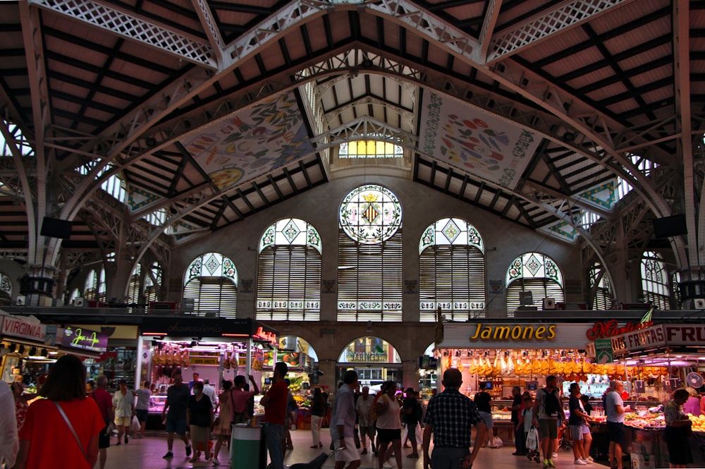 a large group of people inside a building