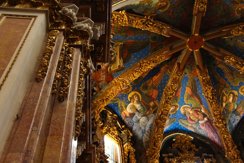 a large ornate ceiling with paintings