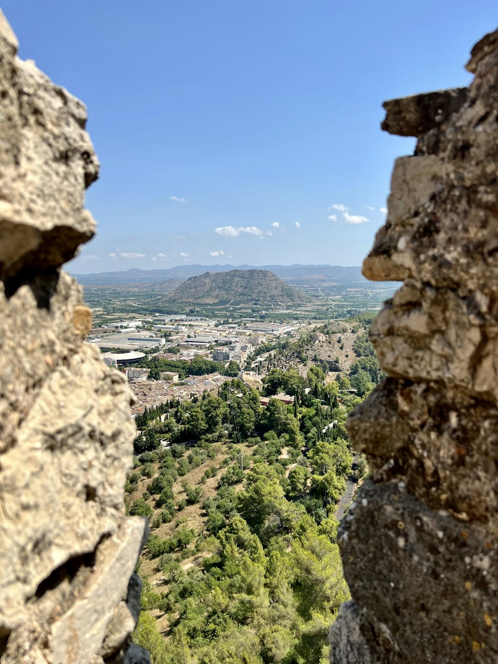 a view of a city from a cliff