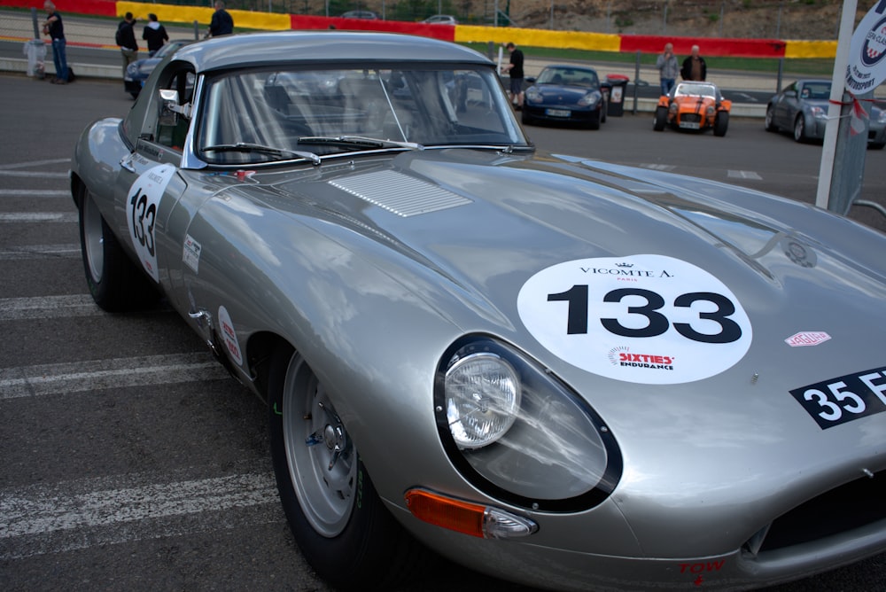 a silver car with a number on it